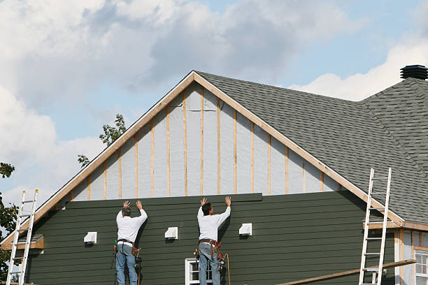 Professional Storm Damage Siding Repair technician working in Franklin, TX